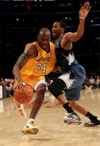 Kobe Bryant drives to basket against Timberwolves.