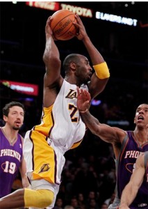 Kobe Bryant looks to pass against Suns.