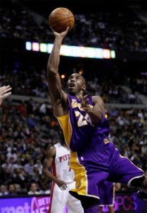 Kobe Bryant scores two of his 33 against Pistons.