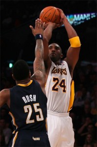 Kobe Bryant shoots over Brandon Rush.