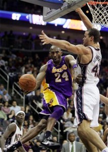 Kobe Bryant dishes off for two against Nets.