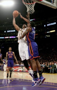 Andrew Bynum rises up for dunk against Knicks.