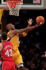 Kobe Bryant makes circus shot against Nets.