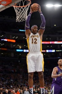 Dwight Howard powers up for two against Kings.