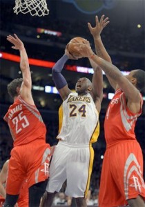 Kobe throws in two points on his way to a triple-double.